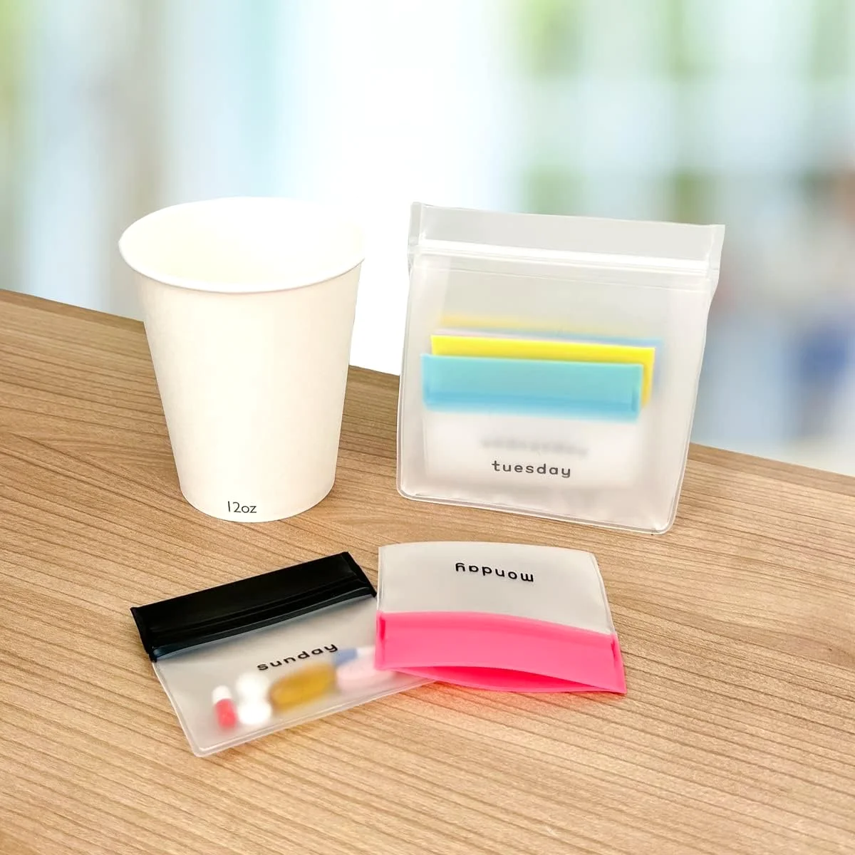 Pouches beside a mug: the week packed, one bag at a time